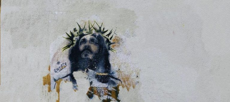 Graffiti of Jesus with crown of thorns; #QWERTY