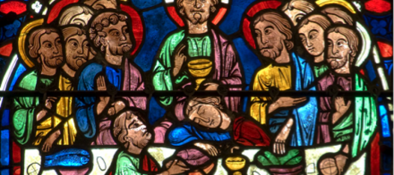 Stained glass depicting the Last Supper; Jesus and disciples