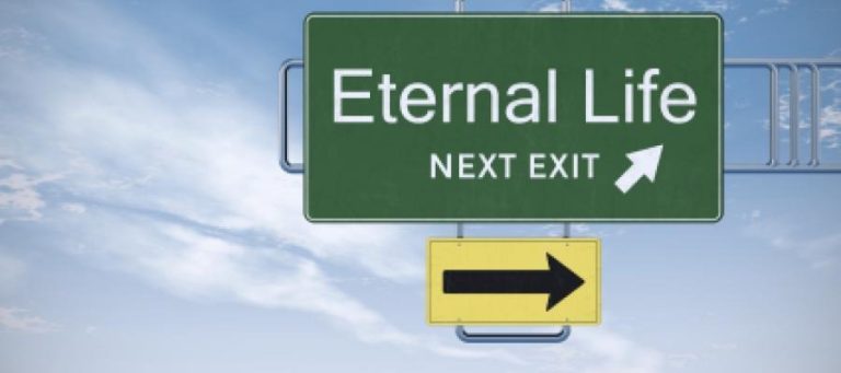 Highway sign: Eternal Life, Next Exit. Arrow points right.