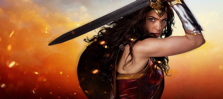 Wonder Woman wielding sword, fiery background