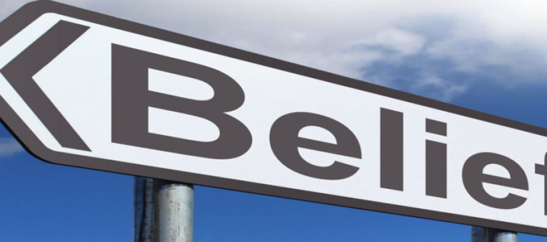 Signpost pointing left with the word "Belief" in bold text.