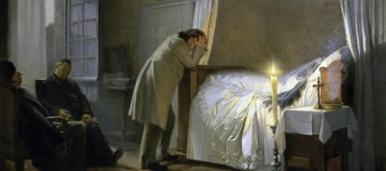 Grieving family members surround a deceased woman's bed. A man kneels, head in hands, expressing profound sorrow.