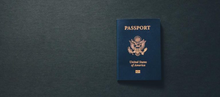 US passport on dark surface