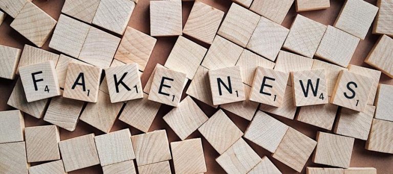 Fake news spelled out in Scrabble tiles