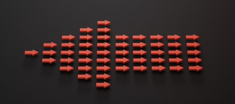 Many red arrows pointing right, forming a large arrow; fewer arrows on the left side.