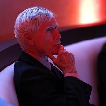 Thoughtful older man in a suit