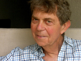 Portrait of a man, possibly a scientist or researcher in the field of neurocosmetology.