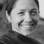 Headshot of a smiling woman.