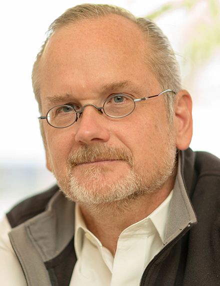 Headshot of a man wearing glasses, possibly a lawyer or intellectual property expert involved in copyright law.