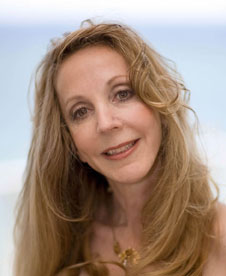 Headshot of a woman with long blonde hair