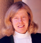 Portrait of a woman, showcasing confident leadership.