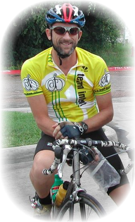 Man in cycling gear on a road bike