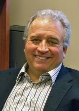Portrait of a smiling man in a business suit