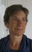 Headshot of a woman with short brown hair